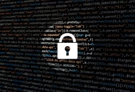 a padlock image with computer code the background