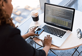 woman looking at computer code