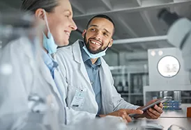 a man and woman developing cloud connected lab equipment