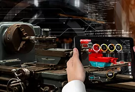 Engineer use augmented reality software in smart factory production line with automated application. Futuristic machinery working in the concept of Industry 4.0 or the fourth industrial revolution.