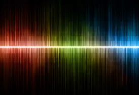 Colored sound wave on a black background, with pulses of blue green and red colors. Bright sound waves.