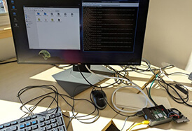 Physical hardware setup featuring the Raspberry Pi 4 running the DEP loopback test.